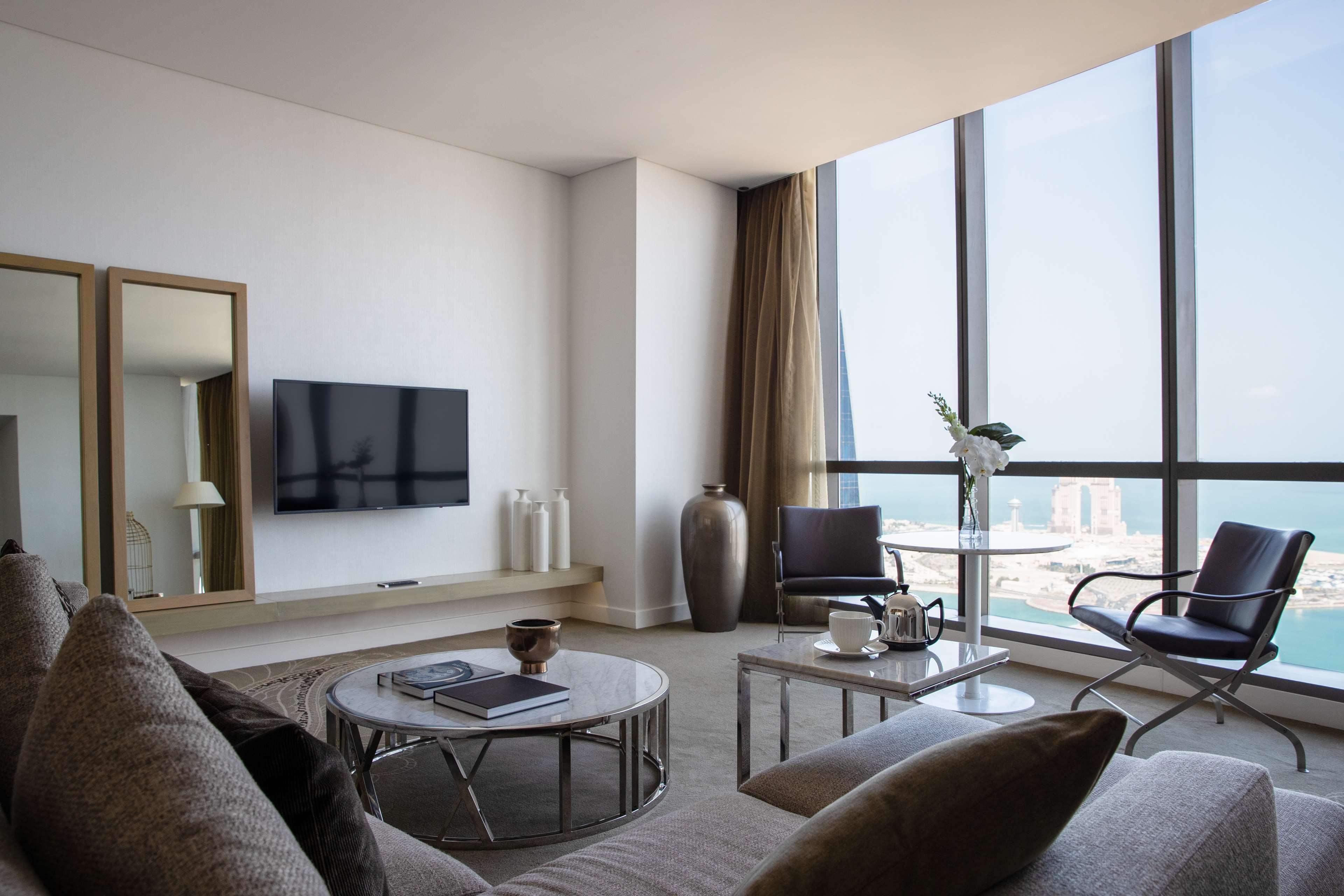 Hotel Conrad Abu Dhabi Etihad Towers Esterno foto A living room in a typical apartment