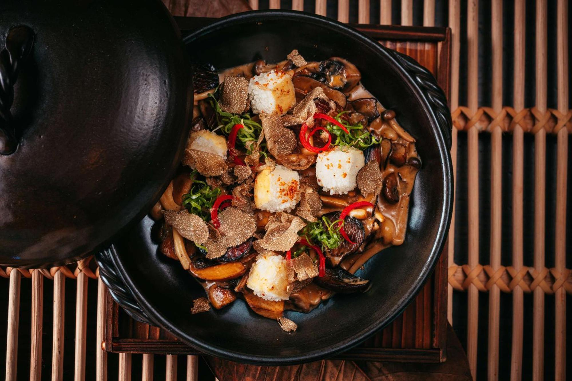 Hotel Conrad Abu Dhabi Etihad Towers Esterno foto A dish of dried fish and shiitake mushrooms